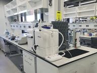 Laboratory with equipment and workstations